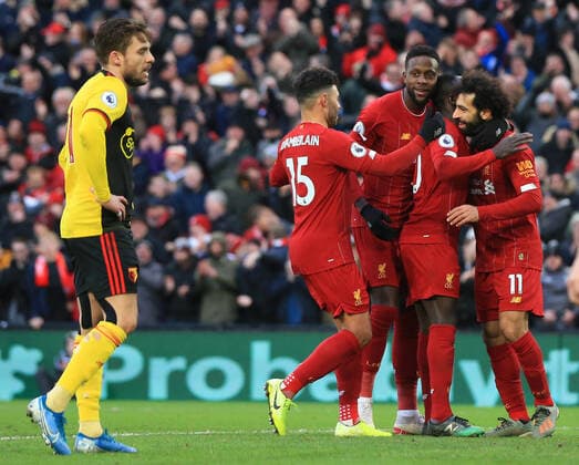 14th December 2019; Anfield, Liverpool, Merseyside, England; English Premier League Football, Liverpool versus Watford; Mohammed Salah of Liverpool celebrates his second goal with team mates Alex Oxlade-Chamberlain, Divock Origi and Sadio Mane - Strictly Editorial Use Only. No use with unauthorized audio, video, data, fixture lists, club league logos or live services. Online in-match use limited to 120 images, no video emulation. No use in betting, games or single club league player publications  ActionPlus12196451 DavidxBlunsden