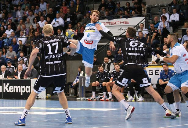 15.12.2019, Deutschland, Stuttgart, Handball 1. Bundesliga Saison 2019 2020 TVB 1898 Stuttgart vs. THW Kiel: v.l. Patrick Wiencek (THW), Rudolf Faluvegi (TVB), Hendrik Pekeler (THW), Robert Markotic (TVB)