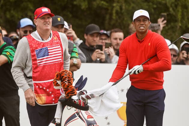December 14, 2019, Victoria, Melbourne, Australila: Tiger Woods (R) and caddie Joe LaCava wait on the second tee during the final round of the 2019 Presidents Cup at The Royal Melbourne Golf Club. Golf 2019: 2019 Presidents Cup: Final Round - ZUMAw109 20191214_zap_w109_108 Copyright: xDebbyxWongx