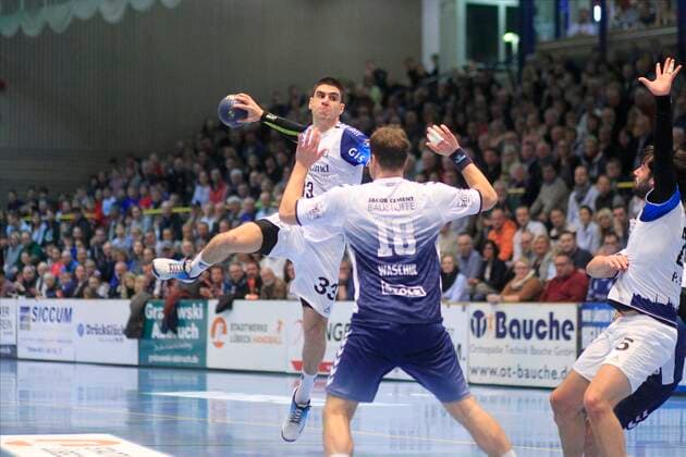 2.Bundesliga Handball VfL Luebeck-Schwartau - TSV Bayer Dormagen 20.12.2019, Hansehalle Luebeck, GER, 2.Bundesliga Handball VfL Luebeck-Schwartau - TSV Bayer Dormagen im Bild picture shows Eloy Morante Maldonado (TSV Bayer Dormagen) im Sprungwurf ueber Martin Waschul VfL Luebeck-Schwartau