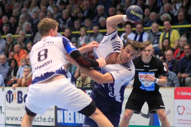2.Bundesliga Handball VfL Luebeck-Schwartau - TSV Bayer Dormagen 20.12.2019, Hansehalle Luebeck, GER, 2.Bundesliga Handball VfL Luebeck-Schwartau - TSV Bayer Dormagen im Bild picture shows Markus Hansen VfL Luebeck-Schwartau im Zweikampf gegen Andre Meuser (TSV Bayer Dormagen)