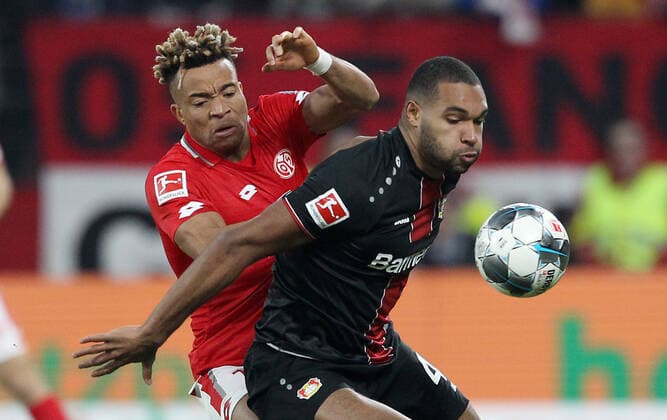 Pierre Kunde Malong (14, Mainz 05), Jonathan Tah (4, Leverkusen), Fussball, 1. Bundesliga: 1. FSV Mainz 05 - Bayer 04 Leverkusen, 17. Spieltag am 21.12.2019, Saison 2019 20, ,m05, ZmdZ, ** Gemäß den Vorgaben der DFL Deutsche Fußball Liga ist es untersagt, in dem Stadion und oder vom Spiel angefertigte Fotoaufnahmen in Form von Sequenzbildern und oder videoähnlichen Fotostrecken zu verwerten bzw. verwerten zu lassen. DFL regulations prohibit any use of photographs as image sequences and or quasi-video. ** 1. FSV Mainz 05 - Bayer 04 Leverkusen