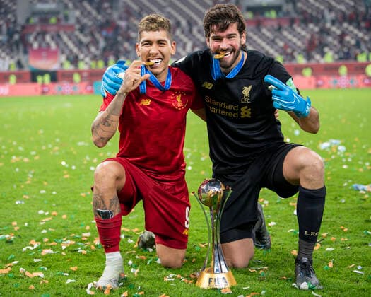 Bilder des Jahres 2019, Sport 12 Dezember Sport Themen der Woche KW51 Sport Bilder des Tages Liverpool v Flamengo DOHA, CA - 21.12.2019: LIVERPOOL V FLAMENGO - Liverpool& 39;berto Fio Firmino and Liverpool& 39;s Alisson celebrate after winning FIFA Club World Cup 20inal, 1-0 ag0 against Flamengo held at the Khalifa International Stadium in Doha, Qatar. (Photo: Richard Callis Fotoarena) x1849197x  RichardxCallis