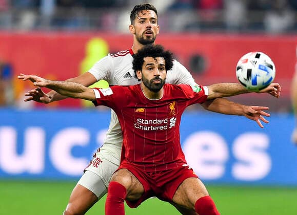 Bilder des Jahres 2019, Sport 12 Dezember Sport Themen der Woche KW51 Sport Bilder des Tages (191222) -- DOHA, Dec. 22, 2019 (Xinhua) -- Mohamed Salah (front) of Liverpool vies for the ball with Pablo Mari of Flamengo during the final of the FIFA Club World Cup Qatar 2019 in Doha, capital of Qatar, Dec. 21, 2019. (Photo by Nikku Xinhua) (SP)QATAR-DOHA-FOOTBALL-FIFA CLUB WORLD CUP-FINAL 