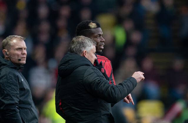 Man Utd manager Ole Gunnar Solskjaer talks to substitute Paul Pogba of Man Utd during the Premier League match between Watford and Manchester United, ManU at Vicarage Road, Watford, England on 22 December 2019. Copyright: xAndyxRowlandx PMI-3263-0021