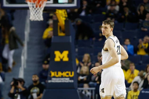 ANN ARBOR, MI - DECEMBER 21: Michigan Wolverines guard Franz Wagner (21) looks over his shoulder as he runs downcourt during a regular season non-conference game between the Presbyterian Blue Hose and the (14) Michigan Wolverines on December 21, 2019, at Crisler Center in Ann Arbor, Michigan. (Photo by Scott W. Grau Icon Sportswire) COLLEGE BASKETBALL: DEC 21 Presbyterian at Michigan Icon19122126