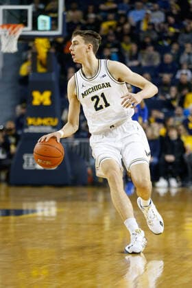 ANN ARBOR, MI - DECEMBER 21: Michigan Wolverines guard Franz Wagner (21) brings the ball up the court during a regular season non-conference game between the Presbyterian Blue Hose and the (14) Michigan Wolverines on December 21, 2019, at Crisler Center in Ann Arbor, Michigan. (Photo by Scott W. Grau Icon Sportswire) COLLEGE BASKETBALL: DEC 21 Presbyterian at Michigan Icon191221392