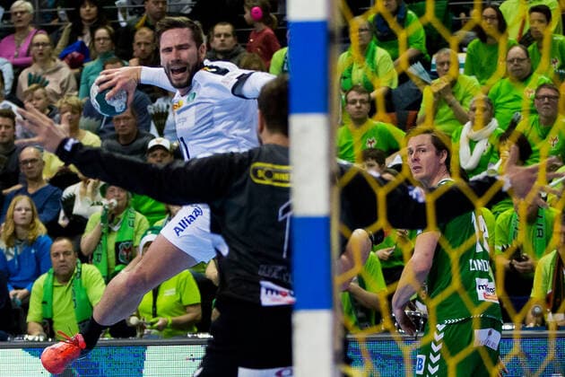 26.12.2019, xfrx, Handball Bundesliga, Fuechse Berlin - SC DHfK Leipzig emspor, v.l. Lukas Binder (SC DHfK Leipzig),Martin Ziemer (Fuechse Berlin) (DFL DFB REGULATIONS PROHIBIT ANY USE OF PHOTOGRAPHS as IMAGE SEQUENCES and or QUASI-VIDEO) Berlin