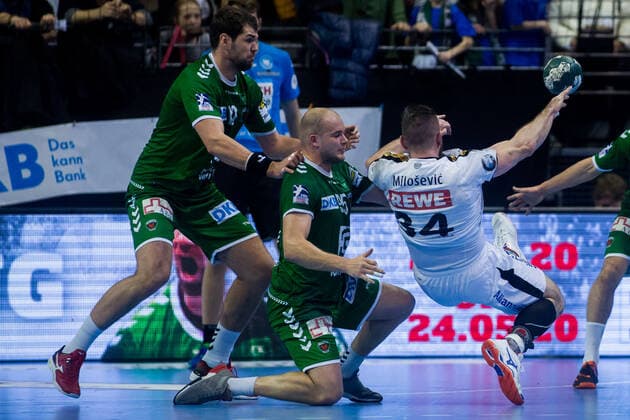 26.12.2019, xfrx, Handball Bundesliga, Fuechse Berlin - SC DHfK Leipzig emspor, v.l. Paul Drux (Fuechse Berlin),Alen Milosevic (SC DHfK Leipzig) (DFL DFB REGULATIONS PROHIBIT ANY USE OF PHOTOGRAPHS as IMAGE SEQUENCES and or QUASI-VIDEO) Berlin