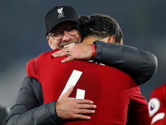 Liverpool manager Jurgen Klopp hugs Virgil van Dijk after the Premier League match against Leicester City at the King Power Stadium, Leicester. Picture date: 26th December 2019. Picture credit should read: Darren Staples Sportimage EDITORIAL USE ONLY. No use with unauthorised audio, video, data, fixture lists, club league logos or live services. Online in-match use limited to 120 images, no video emulation. No use in betting, games or single club league player publications. SPI-0397-0040