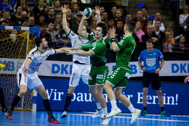 26.12.2019, xfrx, Handball Bundesliga, Fuechse Berlin - SC DHfK Leipzig emspor, v.l. Bastian Roscheck (SC DHfK Leipzig),Jacob Tandrup Holm (Fuechse Berlin) (DFL DFB REGULATIONS PROHIBIT ANY USE OF PHOTOGRAPHS as IMAGE SEQUENCES and or QUASI-VIDEO) Berlin