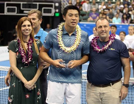 December 28, 2019 - Co-owner operator Kyla Goldsmith, Brandon Nakashima and Hawaii Lieutenant Governor Josh Green pose after the championship match at the Hawaii Open invitational tournament between 44th ranked Sam Querrey (USA) and unranked Brandon Nakashima (USA) at the Stan Sheriff Center in Honolulu, HI - CSM Tennis 2019: Hawaii Open DEC28 - ZUMAc04_ 20191228_zaf_c04_443 Copyright: xMichaelxSullivanx
