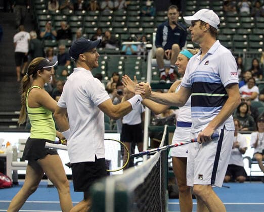 December 28, 2019 - Opponents shake hands after a mixed doubles exhibition match at the Hawaii Open invitational tournament between teams Danielle Collins Sam Querrey and Yanina Wickmayer Christian Harrison at the Stan Sheriff Center in Honolulu, HI - CSM Tennis 2019: Hawaii Open DEC28 - ZUMAc04_ 20191228_zaf_c04_535 Copyright: xMichaelxSullivanx