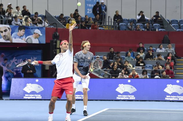December 30, 2019, Zhejiang, Zhejiang, China: Zhejiang,CHINA-Switzerland s Roger federer and Germany s Alexander zverev VS America s Bob blaine mike blaine during the 2019 Tmall cup invitational tennis tournament at the Olympic sports center in Hangzhou, east China s Zhejiang province, Dec. 28, 2019.Federer and Zvelev lost 0-2 to their opponents. Hangzhou international tennis invitational tournament: federer s debut  - ZUMAs145 20191230_zaa_s145_093 Copyright: xZhanxYux