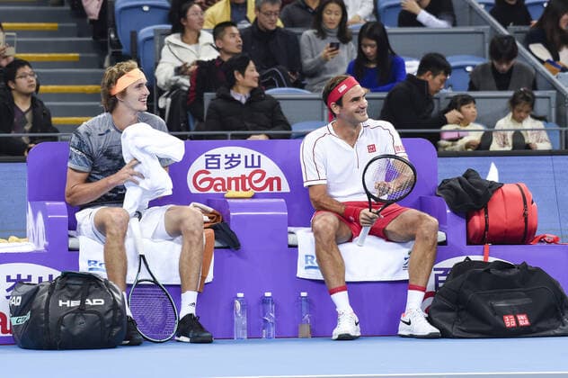 December 30, 2019, Zhejiang, Zhejiang, China: Zhejiang,CHINA-Switzerland s Roger federer and Germany s Alexander zverev VS America s Bob blaine mike blaine during the 2019 Tmall cup invitational tennis tournament at the Olympic sports center in Hangzhou, east China s Zhejiang province, Dec. 28, 2019.Federer and Zvelev lost 0-2 to their opponents. Hangzhou international tennis invitational tournament: federer s debut  - ZUMAs145 20191230_zaa_s145_096 Copyright: xZhanxYux