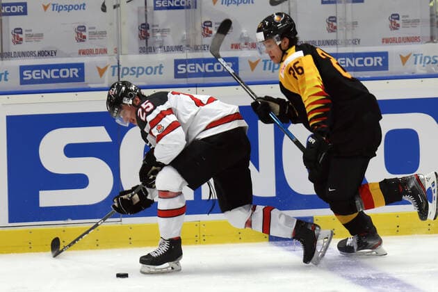 L-R Aidan Dudas (CAN) and Dominik Bokk (GER) in action during the 2020 IIHF World Junior Ice hockey, Eishockey Championships Group B match between Germany and Canada in Ostrava, Czech Republic, on December 30, 2019. (CTKxPhoto PetrxSznapka) CTKPhotoP201912300503401  SZN 11