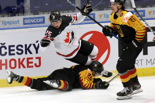 L-R Aidan Dudas (GER), Eric Mik (CAN) and Dominik Bokk (GER) in action during the 2020 IIHF World Junior Ice hockey, Eishockey Championships Group B match between Germany and Canada in Ostrava, Czech Republic, on December 30, 2019. (CTKxPhoto PetrxSznapka) CTKPhotoP201912300503501  SZN 12