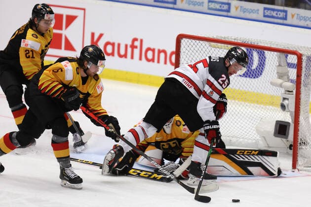 From left Moritz Seider of Germany, Niklas Heinzinger of Germany, Aidan Dudas of Canada and goalkeeper Hendrik Hane of Germany during the 2020 IIHF World Junior Ice hockey, Eishockey Championships Group B match between Germany and Canada in Ostrava, Czech Republic, on December 30th, 2019. (Petr Sznapka CTK via AP) ** SLOVAKIA OUT ** CTKPhotoP201912300558901  CTK803
