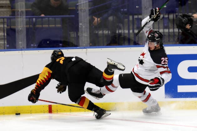 From left Yannik Valenti of Germany and Aidan Dudas of Canada during the 2020 IIHF World Junior Ice hockey, Eishockey Championships Group B match between Germany and Canada in Ostrava, Czech Republic, on December 30th, 2019. (Petr Sznapka CTK via AP) ** SLOVAKIA OUT ** CTKPhotoP201912300564001  CTK804
