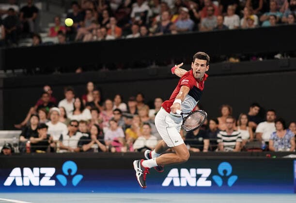 Sport Bilder des Tages ATP, Tennis Herren CUP BRISBANE DAY 2, Novak Djokovic of Serbia returns during his singles match against Kevin Anderson of South Africa on day 2 of the ATP Cup tennis tournament at Pat Rafter Arena in Brisbane, Saturday, January 4, 2020. ( NO ARCHIVING, EDITORIAL USE ONLY, NO USE IN BOOKS WITHOUT CONSENT BRISBANE QLD AUSTRALIA  Copyright: xDAVExHUNTx 20200104001440268569