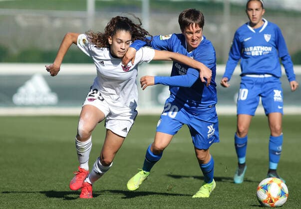 January 4, 2020, Madrid, MADRID, SPAIN: MADRID, SPAIN - JANUARY 4: Ariana Arias Jimenez Ari of CD Tacon and Claire Elisabeth Falknor, of Sevilla FC fight for the ball during Spanish Women Football League football match, played between CD Tacon and Sevilla FC at Ciudad Real Madrid on January 04, 2020 in Madrid, Spain. Soccer: Women League - CD Tacon v Sevilla FC - ZUMAa181 20200104_zaa_a181_180 Copyright: xAFP7x