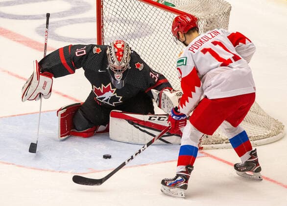 Joel Hofer, goalkeeper of Canada, left, and Vasili Podkolzin of Russia in action during the 2020 IIHF World Junior Ice hockey, Eishockey Championships final game between Russia and Canada in Ostrava, Czech Republic, on January 5, 2020. (CTKxPhoto VladimirxPrycek) CTKPhotoP202001050620801  PRY 0007