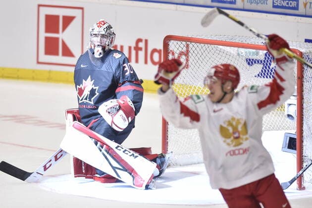Nikita Alexandrov of Russia, right, celebrates after scoring his side s first goal during the 2020 IIHF World Junior Ice hockey, Eishockey Championships final game between Russia and Canada in Ostrava, Czech Republic, on January 5, 2020. At left is Canadian goalkeeper Joel Hofer. (CTKxPhoto JaroslavxOzana) CTKPhotoP202001050644101  _JAO8354