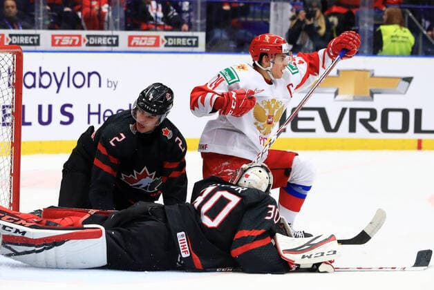 OSTRAVA, CZECH REPUBLIC - JANUARY 5, 2020: Russia s Nikita Aleksandrov (R back) scores a goal past Canada s goaltender Joel Hofer (front) and player Kevin Bahl in the 2020 World Junior Ice hockey, Eishockey Championship final match between Canada and Russia at Ostravar Arena. Peter Kovalev TASS  TS0C97F9