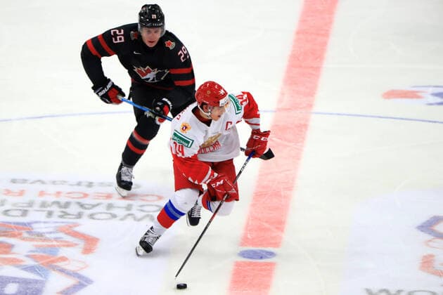 OSTRAVA, CZECH REPUBLIC - JANUARY 5, 2020: Canada s Nolan Foote (L) and Russia s Grigory Denisenko in the 2020 World Junior Ice hockey, Eishockey Championship final match between Canada and Russia at Ostravar Arena. Peter Kovalev TASS  TS0C9803