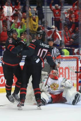 OSTRAVA, CZECH REPUBLIC - JANUARY 5, 2020: Canada s Akil Thomas (L) and Raphael Lavoie (C front) celebrate a goal past Russia s goaltender Amir Miftakhov (R midground) in the 2020 World Junior Ice hockey, Eishockey Championship final match between Canada and Russia at Ostravar Arena; Canada won 4-3. Peter Kovalev TASS  TS0C980A