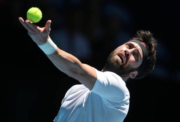 (200106) -- PERTH, Jan. 6, 2020 -- Nikoloz Basilashvili of Georgia serves during the ATP, Tennis Herren Cup Group B match against Nishioka Yoshihito of Japan in Perth, Australia, on Jan. 6, 2020. (Photo by Zhou Dan Xinhua) (SP)AUSTRALIA-PERTH-TENNIS-ATP CUP-DAY 4 BaixXuefei 