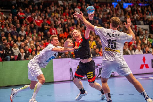 HANDBALL - AUT vs GER, test match VIENNA,AUSTRIA,06.JAN.20 - HANDBALL - OEHB international match, Länderspiel, Nationalmannschaft Austria vs Germany, test match. Image shows Kevin Schmidt (GER) and Fabian Posch (AUT). GEPAxpictures xDavidxBitzan