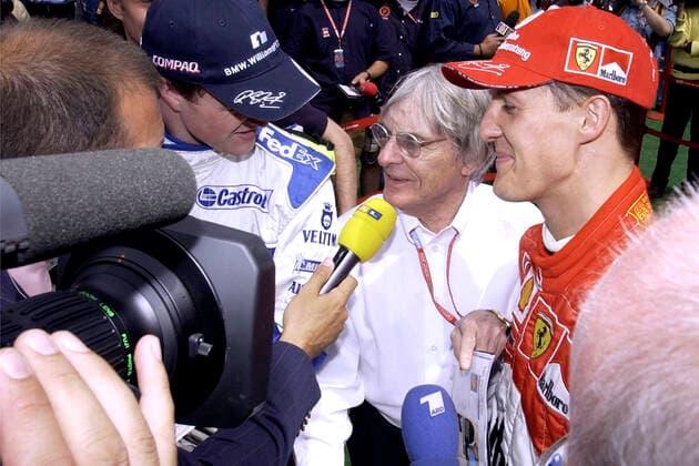 SCHUMACHER Michael F1 Team Scuderia Ferrari mit Bruder SCHUMACHER Ralf , ECCLESTONE Bernie und EBEL Kai RTL GP von Spanien 2002 in Barcelona am 27. 04. 2002 in Barcelona