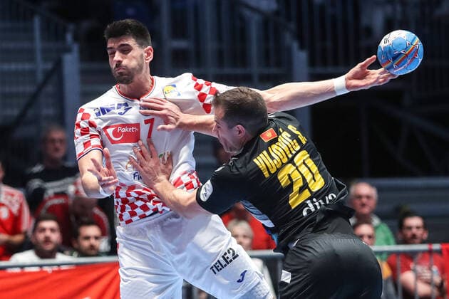 Croatia vs Montenegro: Group A - Men s EHF EURO 2020 GRAZ, AUSTRIA - JANUARY 09: Luka Stepancic of Croatia is challenged by Stevan Vujovic of Montenegro during the Men s EHF EURO 2020 group A match between Croatia and Montenegro at Stadthalle on January 9, 2020 in Graz, Austria.  LukaxStanzl PIXSELL
