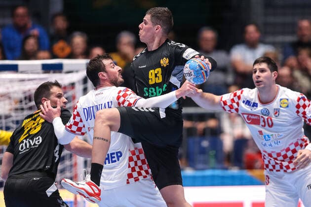 Croatia vs Montenegro: Group A - Men s EHF EURO 2020 GRAZ, AUSTRIA - JANUARY 09: Vladan Lipovina of Montenegro is challenged by Domagoj Duvnjak of Croatia during the Men s EHF EURO 2020 group A match between Croatia and Montenegro at Stadthalle on January 9, 2020 in Graz, Austria.  LukaxStanzl PIXSELL