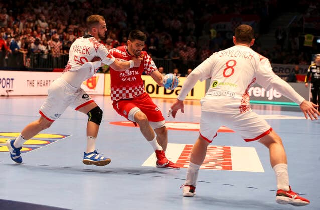HANDBALL - EHF EURO 2020, CRO vs BLR GRAZ,AUSTRIA,11.JAN.20 - HANDBALL - EHF European Men s Handball Championship 2020, group stage, Croatia vs Belarus. Image shows Artsem Karalek (BLR), Luka Stepancic (CRO) and Siarhei Shylovich (BLR). GEPAxpictures xWolfgangxGrebien