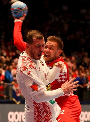 HANDBALL - EHF EURO 2020, CRO vs BLR GRAZ,AUSTRIA,11.JAN.20 - HANDBALL - EHF European Men s Handball Championship 2020, group stage, Croatia vs Belarus. Image shows Siarhei Shylovich (BLR) and Luka Cindric (CRO). GEPAxpictures xWolfgangxGrebien