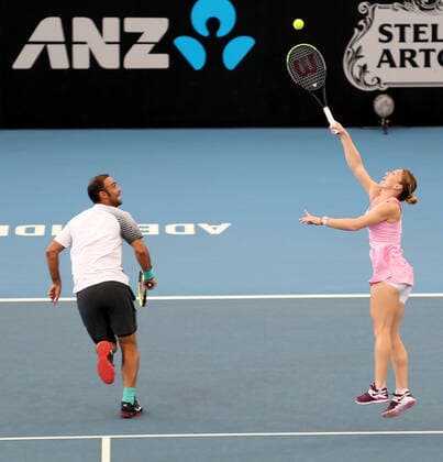 ADELAIDE INTERNATIONAL DAY 1, Juan Sebastian Cabal of Colombia plays a shot against Angelique Kerber of Germany and Robert Farah of Columbia during the Adelaide International Rally for Resilience exhibition game on day 1 of the Adelaide International tennis tournament atMemorial Drive Tennis Centre inAdelaide, Sunday, January 12, 2020. ( NO ARCHIVING, EDITORIAL USE ONLY, NO USE IN BOOKS WITHOUT CONSENT ADELAIDE SA AUSTRALIA  Copyright: xKELLYxBARNESx 20200112001441698378