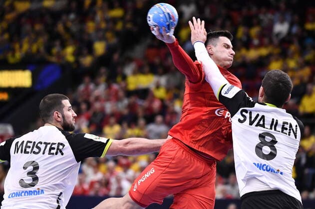 Gothenburg 202001112 Poland s Maciej Piltowski shot Switzerland s Michal Svajlen (8) during the Men s EHF EURO 2020 Handball group F match preliminary round between Switzerland and Poland in Scandinavium Arena Sunday Jan. 12, 2020. Photo Bjorn Larsson Rosvall TT kod 9200 Gothenburg Sweden x9200x