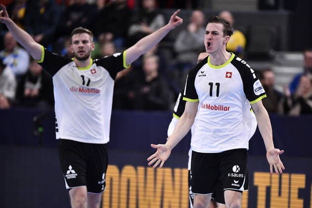 Gothenburg 202001112 Switzerland s Samuel Rothilsberger and Roman Sidorowicz (11) react after a goal during the Men s EHF EURO 2020 Handball group F match preliminary round between Switzerland and Poland in Scandinavium Arena Sunday Jan. 12, 2020. Photo Bjorn Larsson Rosvall TT kod 9200 Gothenburg Sweden x9200x