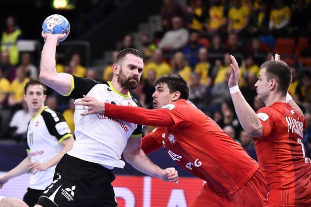 Gothenburg 202001112 Switzerland s Alen Milosevic with the ball Poland s Piotr Chrapkowskl (R) during the Men s EHF EURO 2020 Handball group F match preliminary round between Switzerland and Poland in Scandinavium Arena Sunday Jan. 12, 2020. Photo Bjorn Larsson Rosvall TT kod 9200 Gothenburg Sweden x9200x
