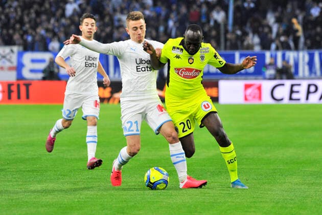 Sada Thioub (SCO Angers) - Valentin Rongier (Olympique de Marseille) FOOTBALL : Olympique de Marseille vs SCO Angers - Ligue 1 Conforama - Marseille - 25 01 2020 NorbertScanella PanoramiC 