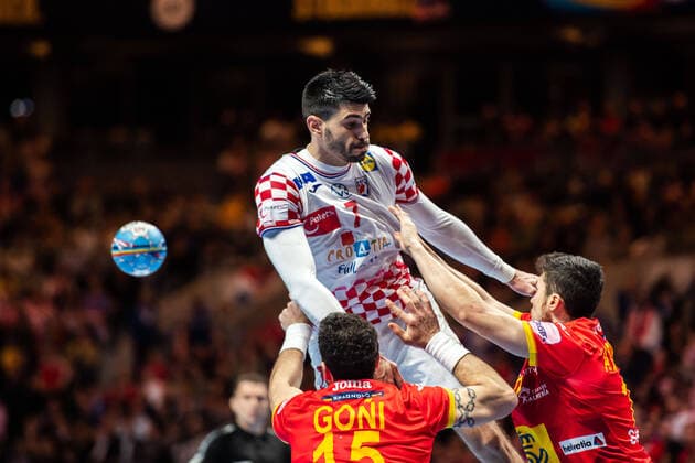 200126 Luka Stepanic of Croatia and Iousu Goni Leoz of Spain during the EHF European Handball Championship final between Spain and Croatia on January 26, 2020 in Stockholm. Copyright: JOHANNAxLUNDBERG BB200126JL008