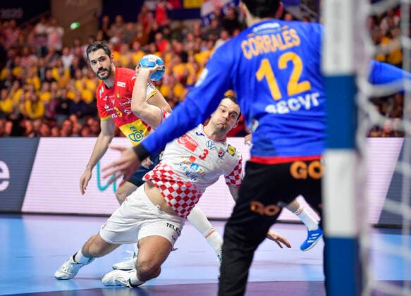 Croatia s Marino Maric (C) scores the opening goal at Spain s goalkeeper Rodrigo Rodal Corrales during the Men s European Handball Championship final match between Spain and Croatia in Stockholm, Sweden, on Jan. 26, 2020. Stockholm Sverige HANDBALL x10040x