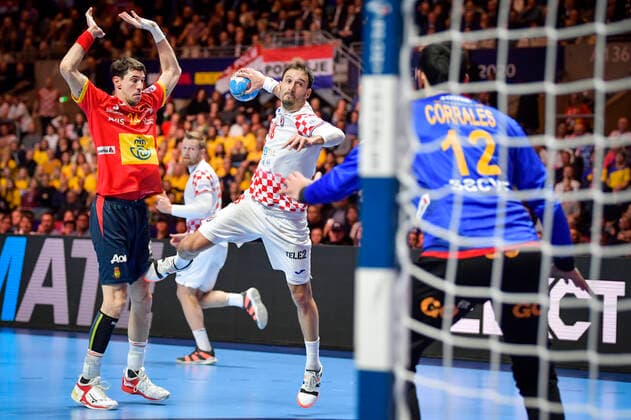 Spain s Viran Morros de Argila (L) and Croatia s Igor Karacic with the ball during the Men s European Handball Championship final match between Spain and Croatia in Stockholm, Sweden, on Jan. 26, 2020. Stockholm Sverige HANDBALL x10040x
