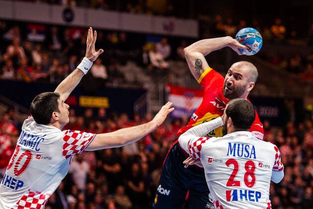 200126 Joan Canellas Reixach of Spain against Marko Mamic and Zeljko Musa of Croatia during the EHF European Handball Championship final between Spain and Croatia on January 26, 2020 in Stockholm. Copyright: JESPERxZERMAN BB200126JZ028