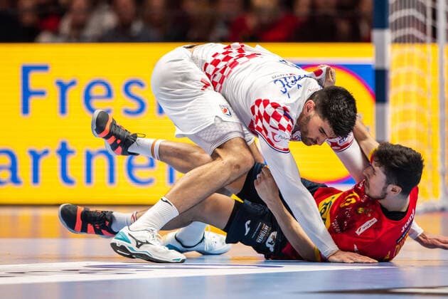 200126 Luka Stepanic of Croatia and Alex Dujshebaev Dovichebaeva of Spain during the EHF European Handball Championship final between Spain and Croatia on January 26, 2020 in Stockholm. Copyright: JESPERxZERMAN BB200126JZ061