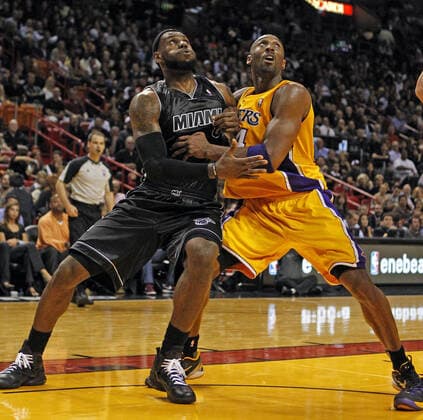 January 19, 2012, Miami, FL, USA: Miami Heat s LeBron James fights with Los Angles Lakers s Kobe Bryant under the basket in the second quarter at the American Airlines Arena in Miami, Florida, January 19, 2012. Kobe Bryant - ZUMAm67_ 20120119_zaf_m67_002 Copyright: xCharlesxTrainorxJrx