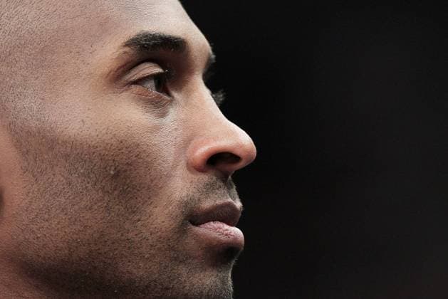 In this January 26, 2014 file photo, Los Angeles Lakers Kobe Bryant stands during a time out against the New York Knicks at Madison Square Garden in New York City. Bryant was killed in a helicopter crash with his 13-year-old daughter Gianna in Calabasas, California on January 26, 2020. UPI John Angelillo  LAP202001262020 JOHNxANGELILLO