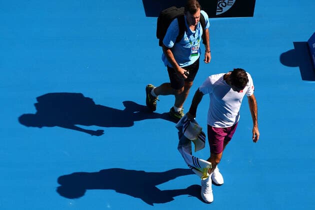AUSTRALIAN OPEN DAY 9, Roger Federer of Switzerland leaves the court for a medical time out during his fifth round match against Tennys Sandgren of the USA on day nine of the Australian Open tennis tournament at Rod Laver Arena in Melbourne, Tuesday, January 28, 2020. ( NO ARCHIVING, EDITORIAL USE ONLY, NO USE IN BOOKS WITHOUT CONSENT MELBOURNE VIC AUSTRALIA  Copyright: xSCOTTxBARBOURx 20200128001445153730